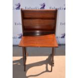 20th century mahogany desk, the fall front on pull-out supports, 115 x 62 x 66cm.