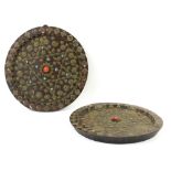 Pair of Tibetan circular wooden plaques the metal work set with coloured stones 36cm dia.