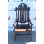 19th century oak armchair, carved and pierced backrest and scroll arms, on turned legs and