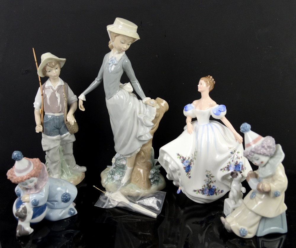 Collection of Lladro figures and a Royal Doulton figurine Sold on behalf of Princess Alice Hospice .