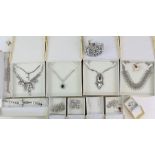 A group of fashion jewellery, boxed and unworn including bangles, rings, tortoise brooch, many items