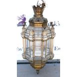 Middle Eastern style pierced metal and glass ceiling light, with pineapple finials (one missing), H.