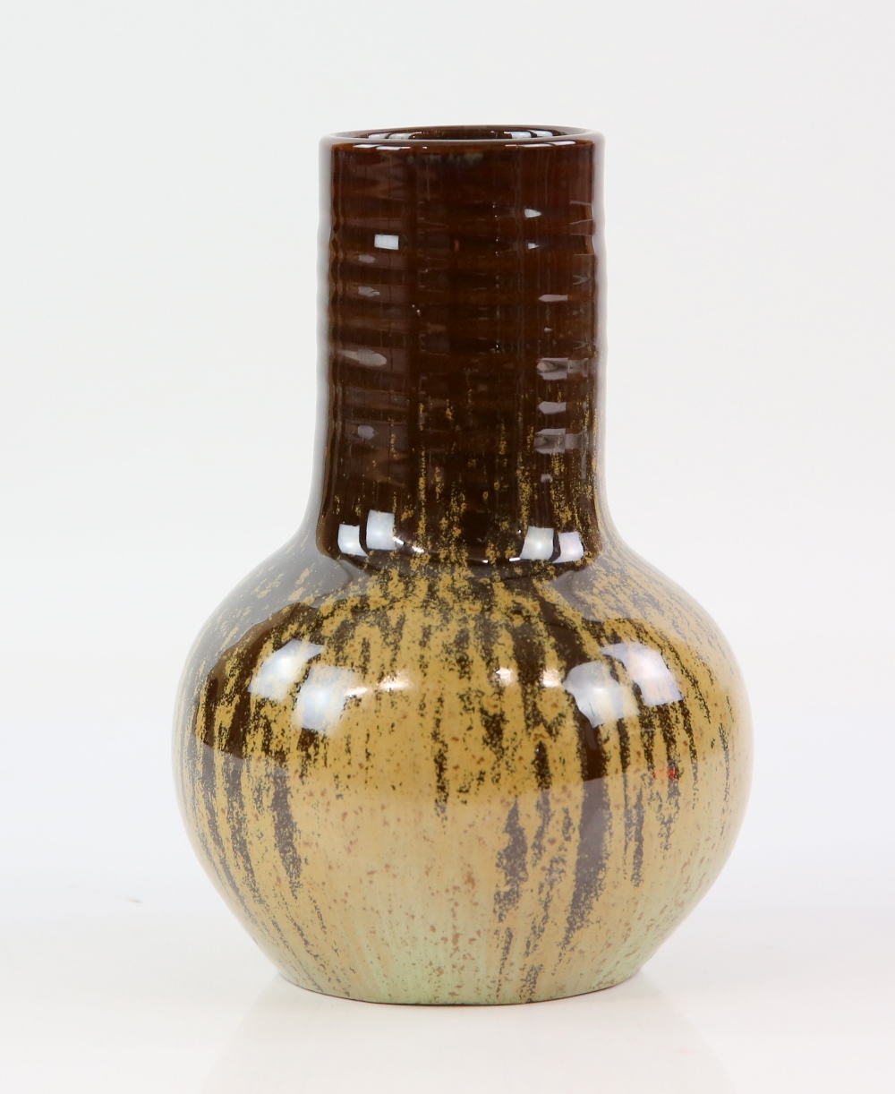 Poole Studio pottery vase in a brown drip glaze,. 19cm highminor glazing fault to foot rim