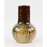 Poole Studio pottery vase in a brown drip glaze,. 19cm highminor glazing fault to foot rim