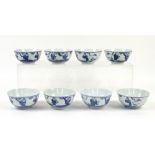 A set of eight Chinese or other Asian blue and white bowls; each decorated with The Sanxing [Fu,
