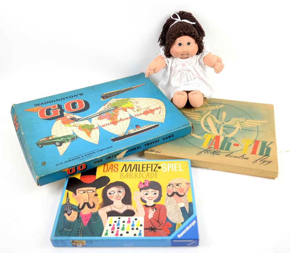 Cabbage patch doll and vintage board games.