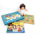 Cabbage patch doll and vintage board games.