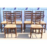 Set of six 19th century ladderback chairs, with rush seats .