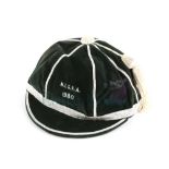 Northern Ireland Schoolboys Cap from 1980 presented to Norman Whiteside, 'N.I.S.F.A. 1970', green