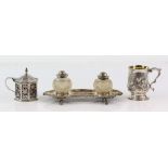 Georgian silver group of items comprising a christening mug, decorated with flowers and cartouche in