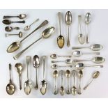 Group of silver and silver-plated spoons to include two Dutch apostle spoons, table spoons, etc,