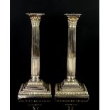 Pair of Mappin and Webb Princess plate Corinthian column 6 branch candelabra with detachable scones.