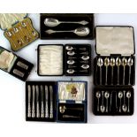 Group of cased silver and silver plated flatware sets including a set of six silver grapefruit