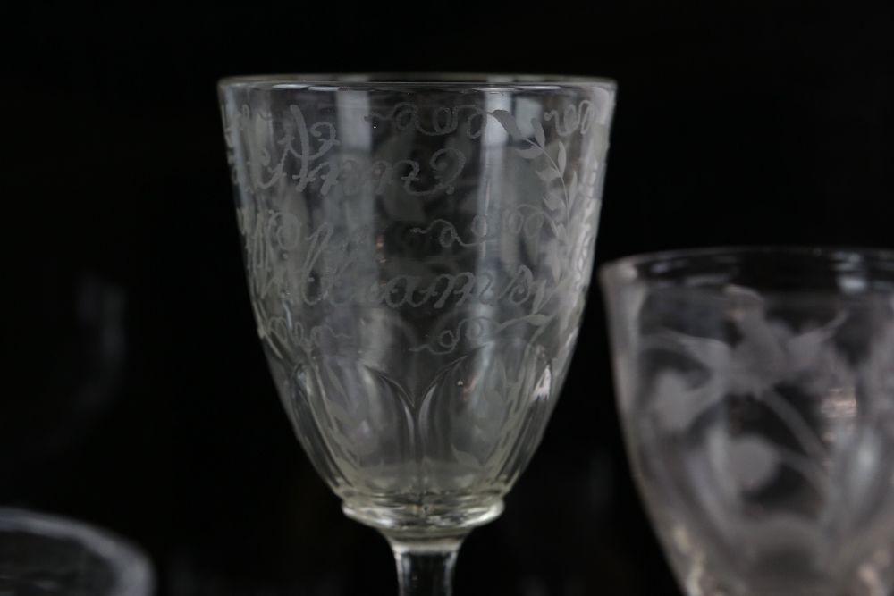 An 18th century ale glass engraved with birds and flowers, a Georgian glass rummer engraved Ann - Image 4 of 4