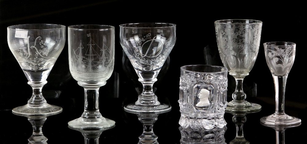 An 18th century ale glass engraved with birds and flowers, a Georgian glass rummer engraved Ann