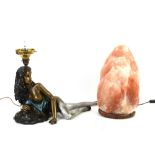A pair of salt stone lamps, H.35cm, together with a cast metal figural table lamp in the form of a