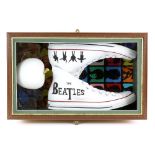 The Beatles - Pair of unused white Converse framed in presentation display with white apple. 28 x 45