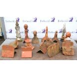 Collection of Terracotta items to include roof finials, and a planter in form of a skull (15)