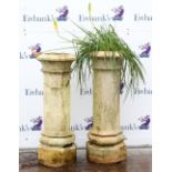 Pair terracotta garden planters of octagonal column form, H.112cm