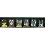 The Beatles six Franklin Mint hand crafted figurines with glass domes, framed. Frame dimensions: