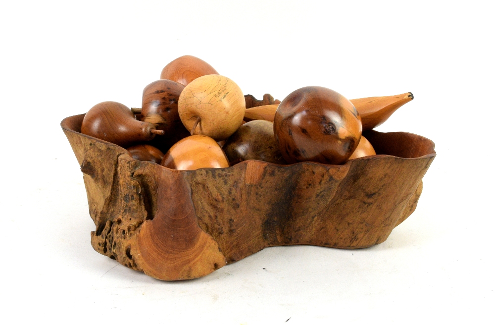 Rustic wooden fruit bowl, together with wooden fruit, 11 x 38 x 32cm (bowl)