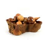 Rustic wooden fruit bowl, together with wooden fruit, 11 x 38 x 32cm (bowl)