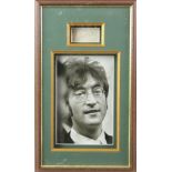 John Lennon - Mounted and framed signature on cream paper of the Beatles star, framed with