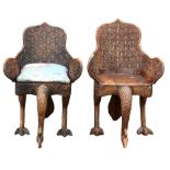 Pair of 20th century Anglo-Indian carved teak chairs in the form of peacocks, the legs carved as