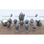 Group of nine composite acorn finials, H.31cm, together with a large cast plaster acorn finial H.