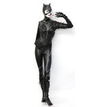 AMENDED DESCRIPTION Batman - Two life-size mannequins in full Catwoman costumes, and a Batman