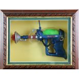 Tim Burton collection including eight framed Mars Attacks figures, framed Mars Attacks pistol and