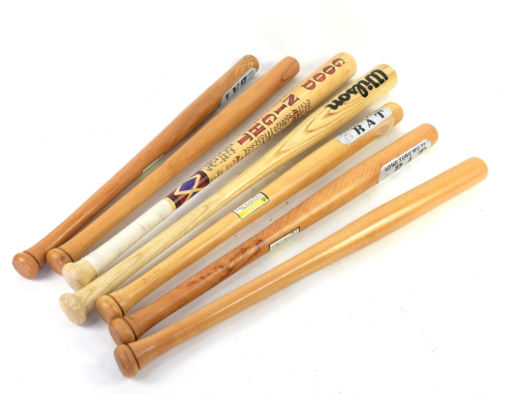 Collection of seven baseball bats, to include a Harley Quinn branded baseball bat (7) Harley Quin