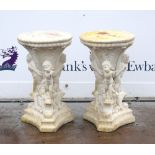 Pair of plaster jardinere stands, circular tops supported by three cherubs, on stepped bases, H.53cm