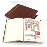 Album of World Stamps together with First Day Cover album with covers and Presentation Packs