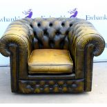 20th century faux leather button back Chesterfield club armchair, H67 x W105 x D90cm