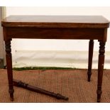 19th century mahogany crossbanded card table on turned supports,