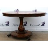 19th century walnut circular breakfast table, on column and circular base and three paw feet,