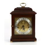 Herlme three train mantle clock in mahogany case, H30 x W20 x D11.5cm