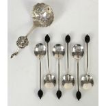 Silver caddy spoon with Archer finial Chester 1903 and a set of six rat tail silver coffee bean