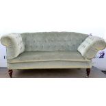 20th century Chesterfield drop-end sofa, Tear to upholstery at backrest. Mechanism needs repair.