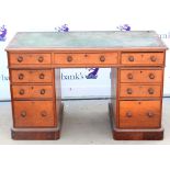 Late 19th / early 20th century mahogany pedestal desk, with an arrangement of nine drawers on