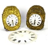 Two wall clocks, together with a wall clock movement, two Comtoise clocks and a round clock dial