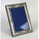 Sheffield silver photo frame with hammered finish and shell design 225mm x 175 mm by R Carr