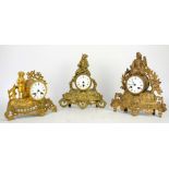 Three French gilt spelter mantle clocks, to include a 19th century gilt spelter mantle clock with