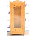 Early 20th Century child's oak wardrobe, with glazed door with decorative print, W168 x W69.5 x