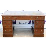 Reproduction mahogany pedestal desk Extensive damage to leather top. Scratches and cracks to