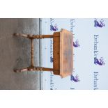 Walnut side table, having a short drawer with a fitted interior, on turned supports, H78 x W62cm,