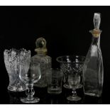 An oversized toasting glass, other glassware to include decanters, glass rolling pin Sarah