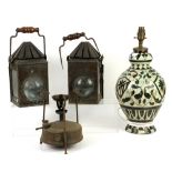 Two miner's lamps, a gas burner and an Italian studio pottery lamp