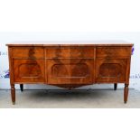 Late 19th century mahogany breakfront sideboard with three drawers over fitted drawer and cupboards,